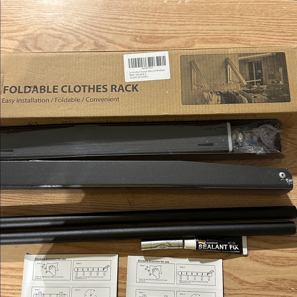 Retractable Clothes Rack with Black Frame - Picture 11 of 13
